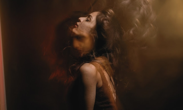 Split-toned portrait showing two sides of the same face, capturing how contradictions make fictional characters feel human Split-toned portrait showing two sides of the same face, capturing how contradictions make fictional characters feel human