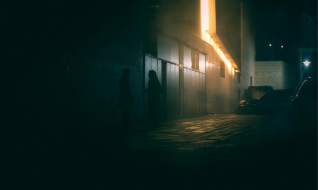 Abstract cinematic artwork showing a silhouette surrounded by echoes of past memories, symbolizing how certain characters linger emotionally